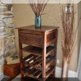 F07. Wood one drawer wine rack. Some damage to finish on top. 38”h x 20”w x 18”d - $95 